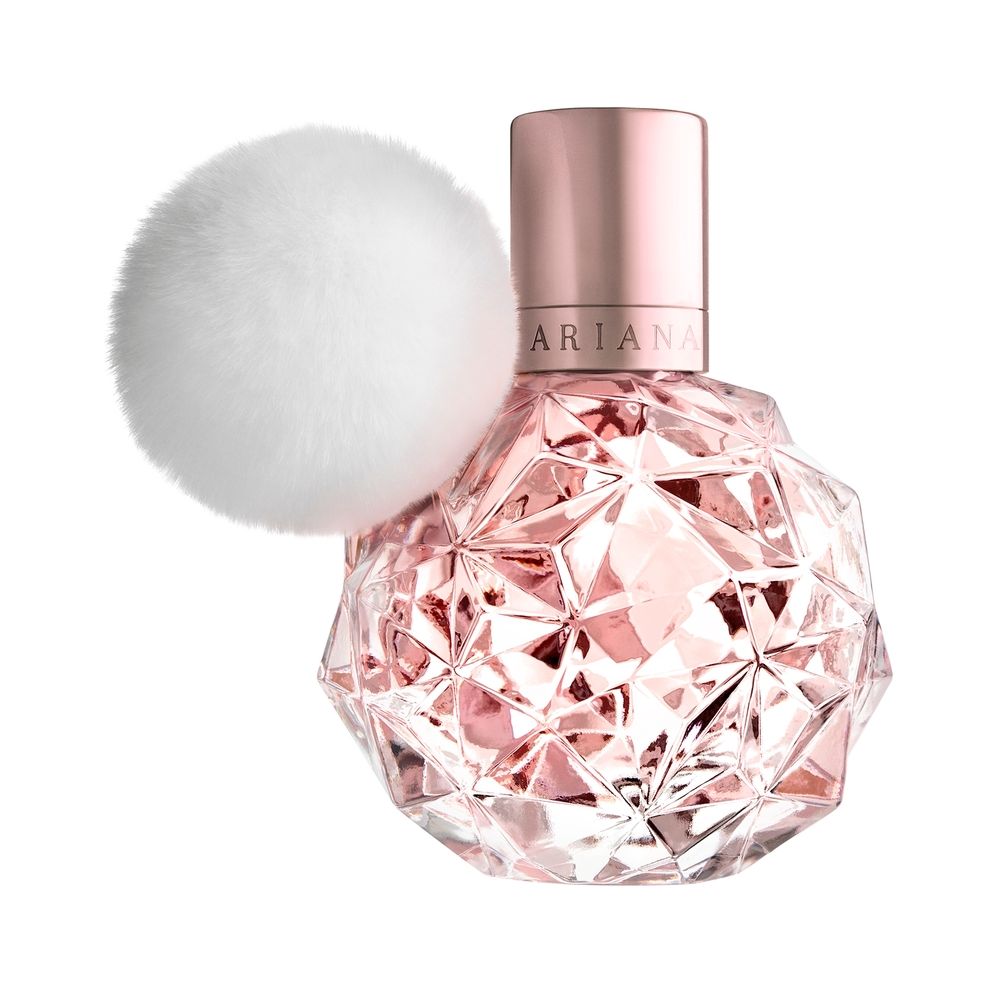 Ariana perfume bottle with a fluffy white pom-pom.