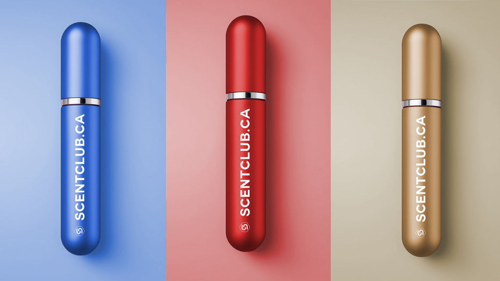 Three perfume atomizers in blue, red, and gold, each with the text scentclub.ca.