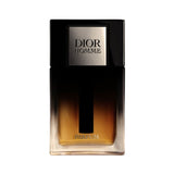 Dior Homme Parfum bottle with black and amber gradient glass.