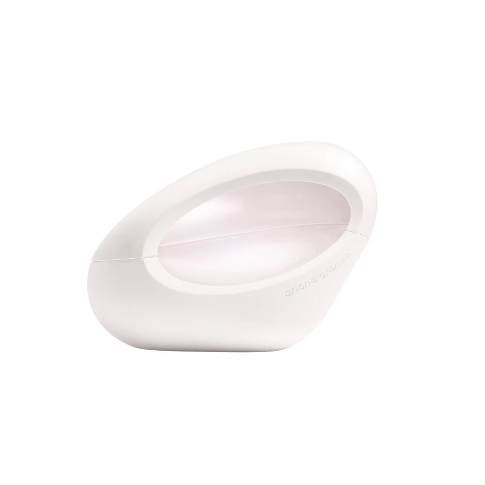 White oval-shaped perfume bottle with "ariana grande" text.